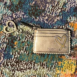 Never used Victoria’s Secret wallet with heart key chain.